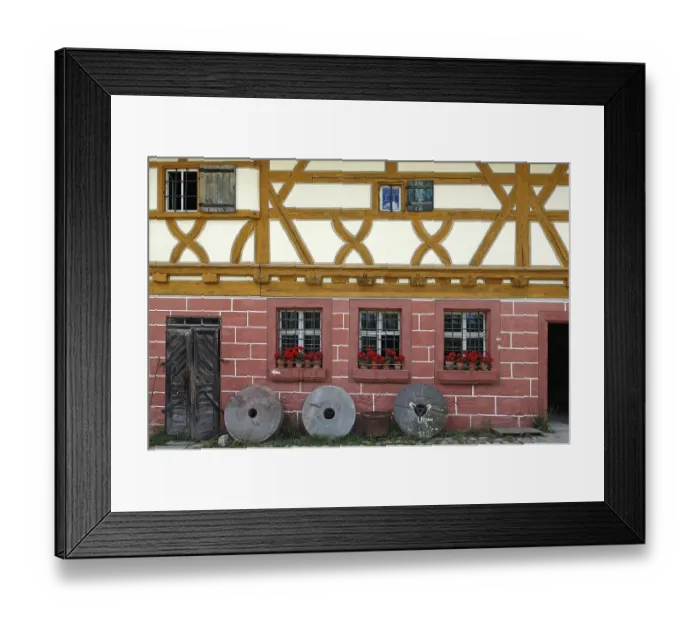 Framed Print : Three millstones in front of the mill