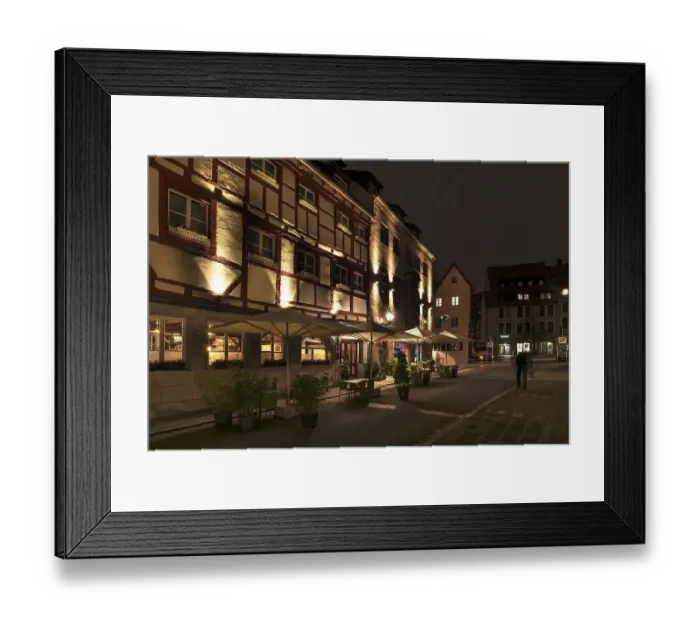 Framed Print : Historic half-timbered houses in the evening