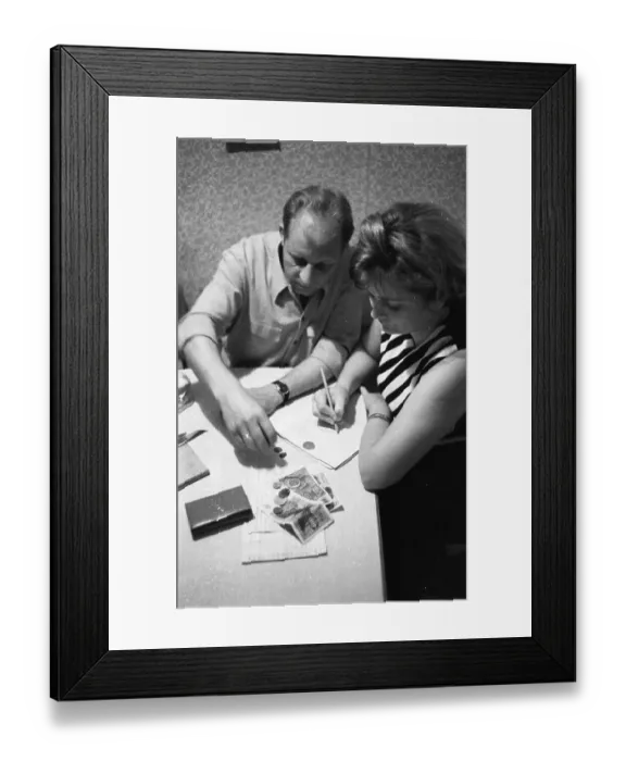 Framed Print : Workers, salaried employees and other low-income earners have to calculate with a sharp pencil