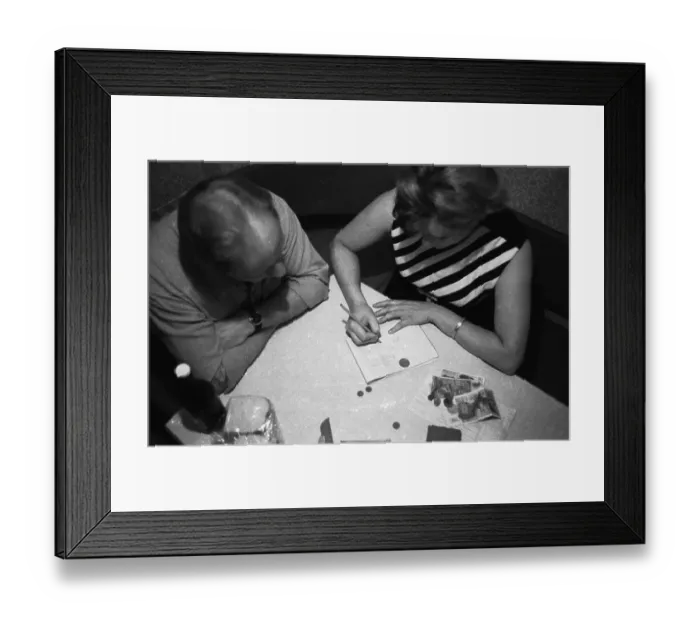 Framed Print : Workers, salaried employees and other low-income earners have to calculate with a sharp pencil