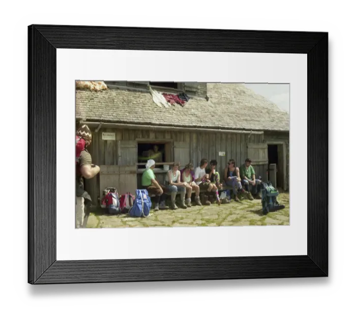 Framed Print : Breganz. Mountain hikers of a German hiking group on a hut hike in the Silvretta on 10