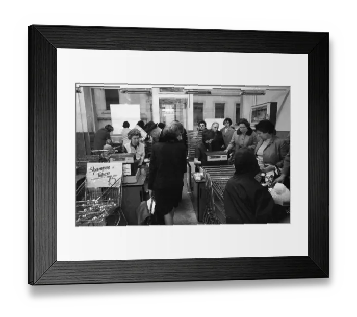 Framed Print : The work of a housewife and mother shopping for groceries at the supermarket and Aldi