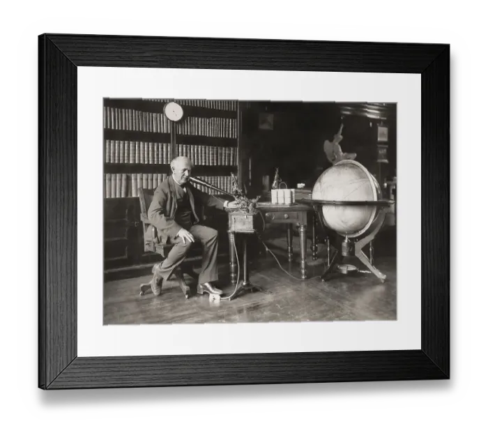 Framed Print : Thomas Alva Edison talking into the business phonograph or ediphone