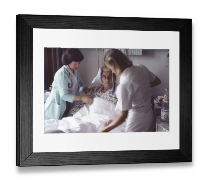 Framed Print : Ruhr. Hospital. Nurse with patient ca. 1982-4