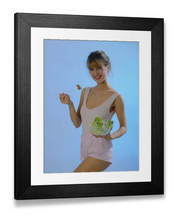 Framed Print : Woman with salad bowl