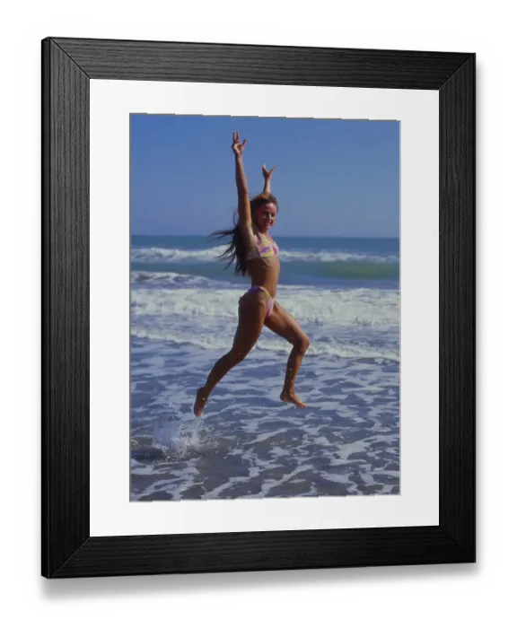 Framed Print : Woman by the sea, jumping