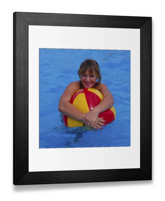 Framed Print : Young woman with water polo swimming pool