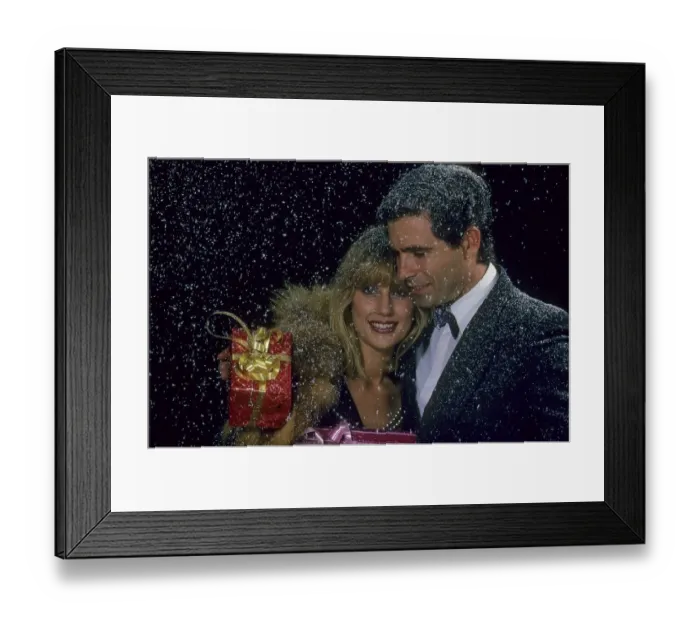 Framed Print : Lovers with Christmas Present, Snowflakes on Shoulder