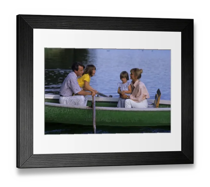 Framed Print : Young family with 2 two children in a rowing boat