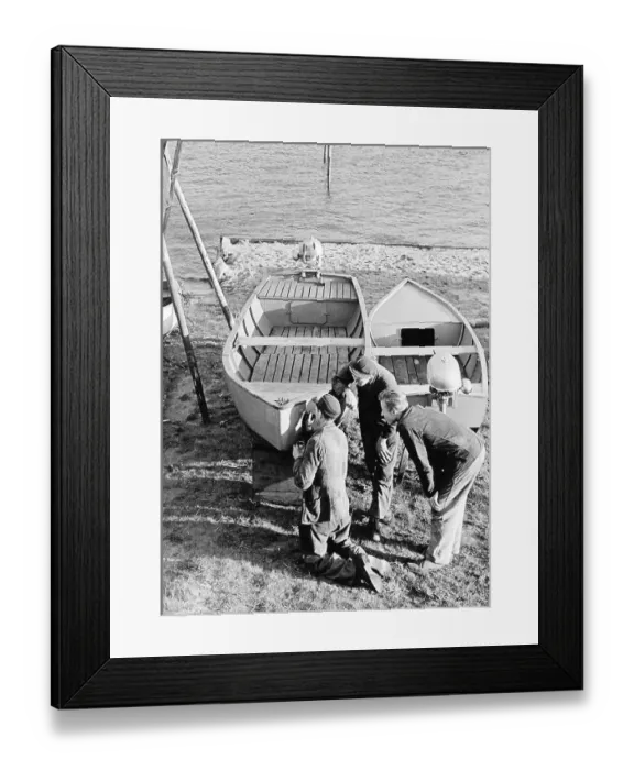 Framed Print : Three men repairing a boat, 1960s