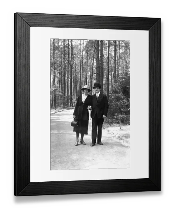 Framed Print : Couple walking in the forest, 1930s Framed Print : Couple walking in the forest, 1930s
