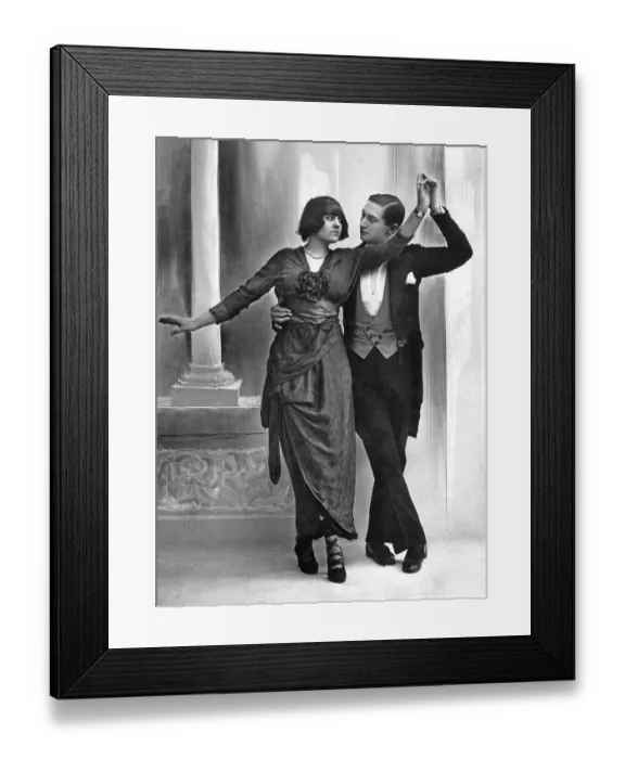 Framed Print : Couple dances with serious gaze Framed Print : Couple dances with serious gaze