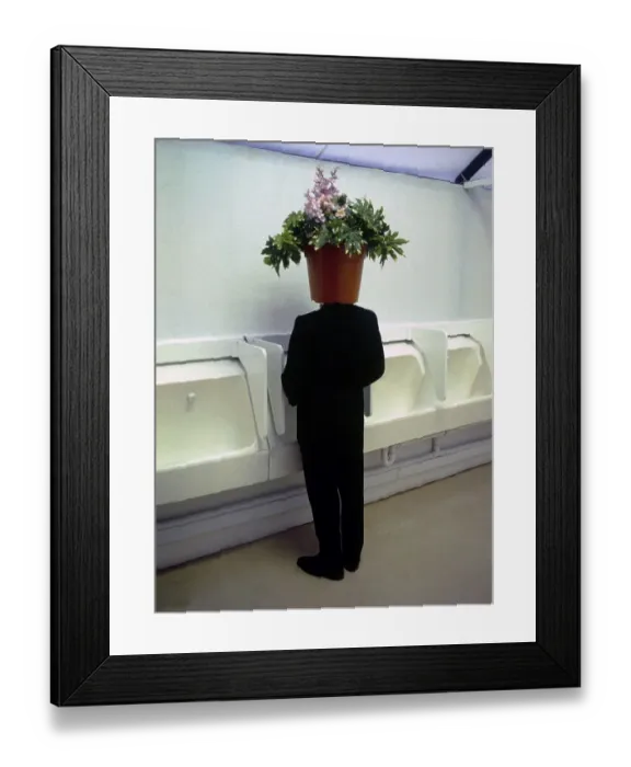 Framed Print : Man with flowerpot on his head in the toilet Framed Print : Man with flowerpot on his head in the toilet