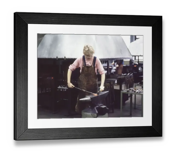 Framed Print : Wolfsburg. Girl in a man's job as an apprentice at VW ca