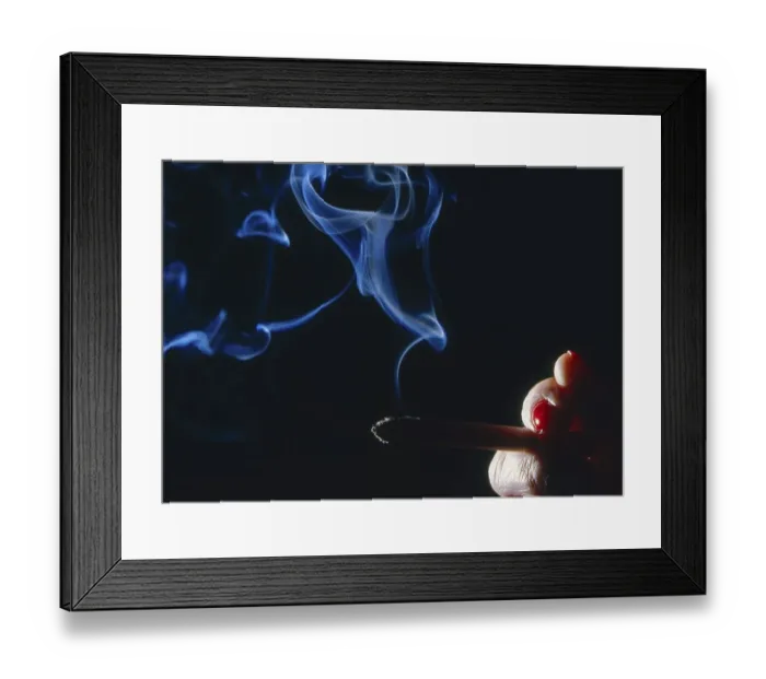 Framed Print : Hand with burning cigarette