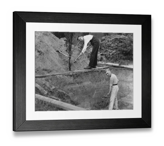 Framed Print : Two men digging a hole, 1940s, exact place unknown Framed Print : Two men digging a hole, 1940s, exact place unknown