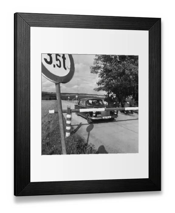 Framed Print : Government representatives with their vehicles in 1966 during a police check at the hitherto secret atomic bunker of