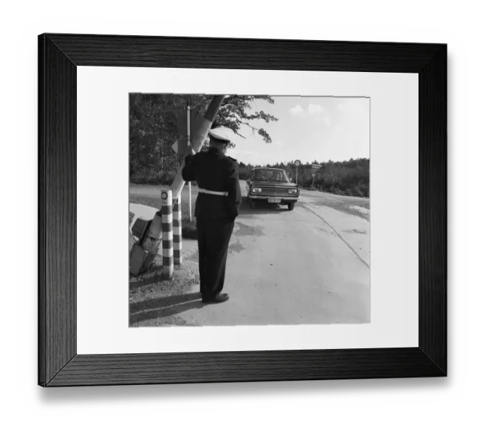 Framed Print : Government representatives with their vehicles in 1966 during a police check at the hitherto secret atomic bunker of