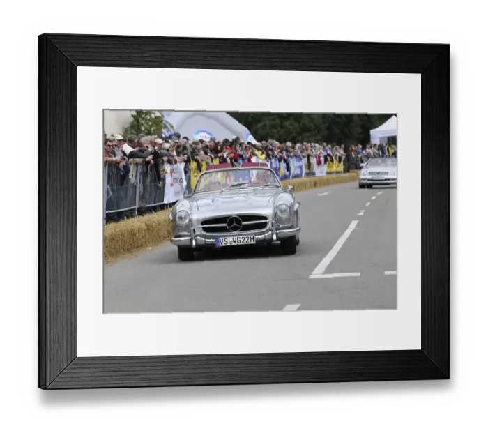 Framed Print : A silver Mercedes-Benz convertible classic car enjoys the attention at a rally