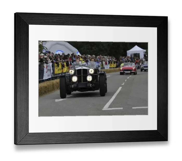 Framed Print : A vintage car with illuminated headlights at a classic car race Framed Print : A vintage car with illuminated headlights at a classic car race
