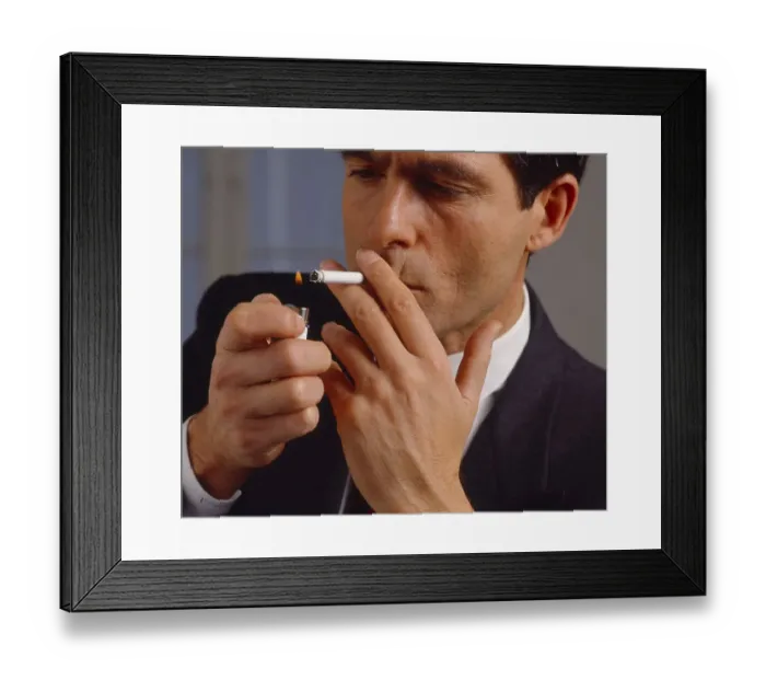 Framed Print : Man, light cigarettes and smoke