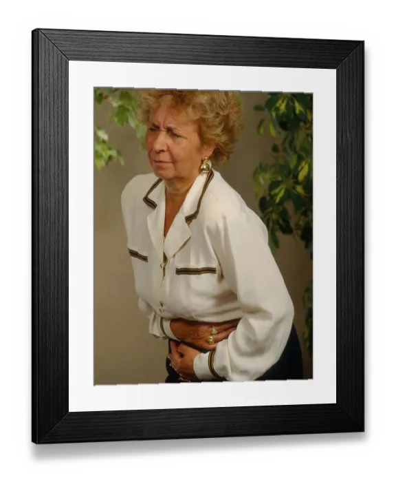 Framed Print : Elderly woman with pain, stomach ache