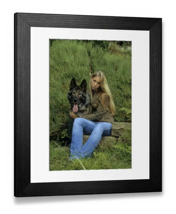 Framed Print : Young blond girl with German Shepherd