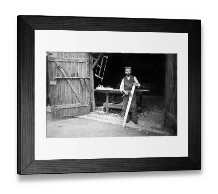 Framed Print : Handicraft, carpenter in front of the workshop Framed Print : Handicraft, carpenter in front of the workshop