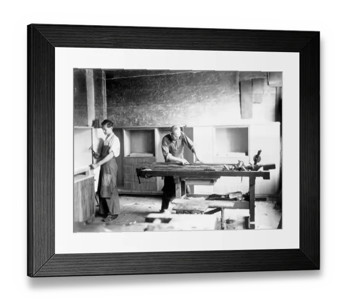 Framed Print : Handicraft, two carpenters working in a workshop