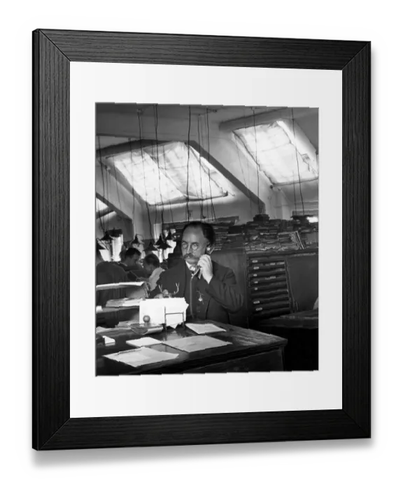 Framed Print : Man on the phone in the office Framed Print : Man on the phone in the office