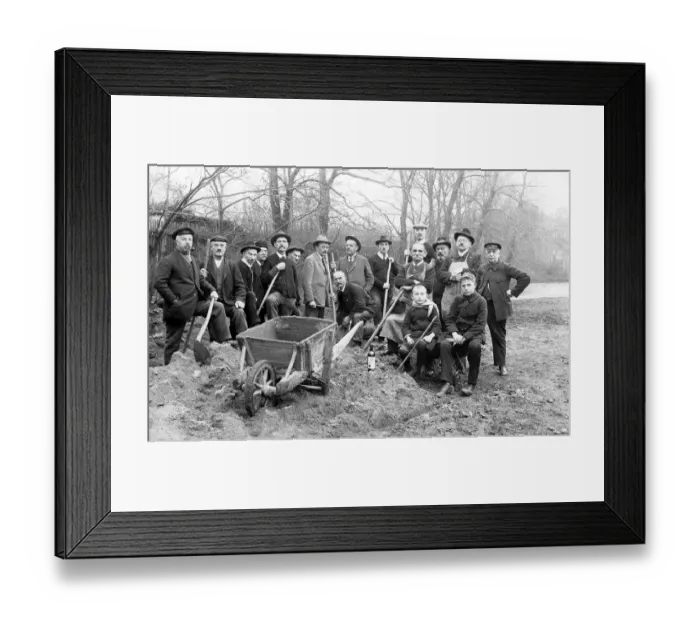 Framed Print : Group picture, construction workers with sand heap and spades
