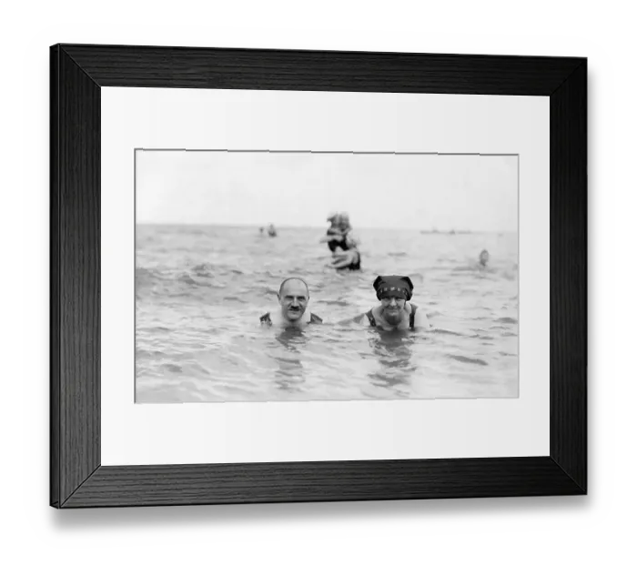 Framed Print : Married couple on holiday swimming in the sea Framed Print : Married couple on holiday swimming in the sea