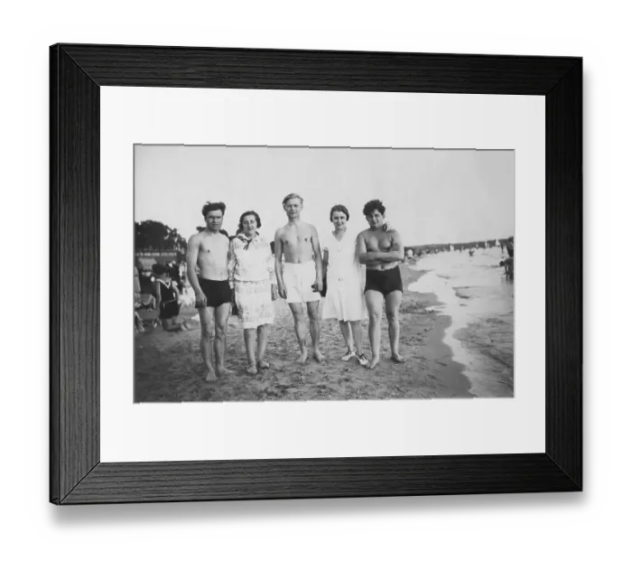 Framed Print : Five young people on the beach
