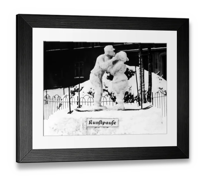 Framed Print : Pair of snow, snowman and snow woman kissing