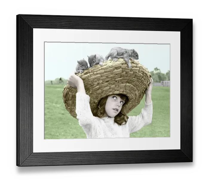 Framed Print : Girl with chipmunks sitting on her straw hat