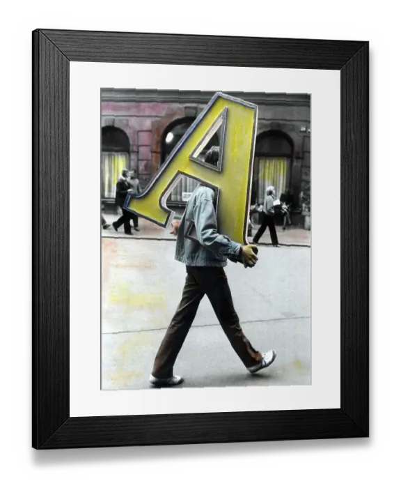 Framed Print : Man transporting letter A ca. 1970s Framed Print : Man transporting letter A ca. 1970s