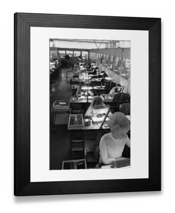 Framed Print : Many woman and a few men work at jobs at Standard Elektrik Lorenz (SEL)
