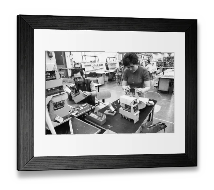 Framed Print : Many woman and a few men work at jobs at Standard Elektrik Lorenz (SEL)