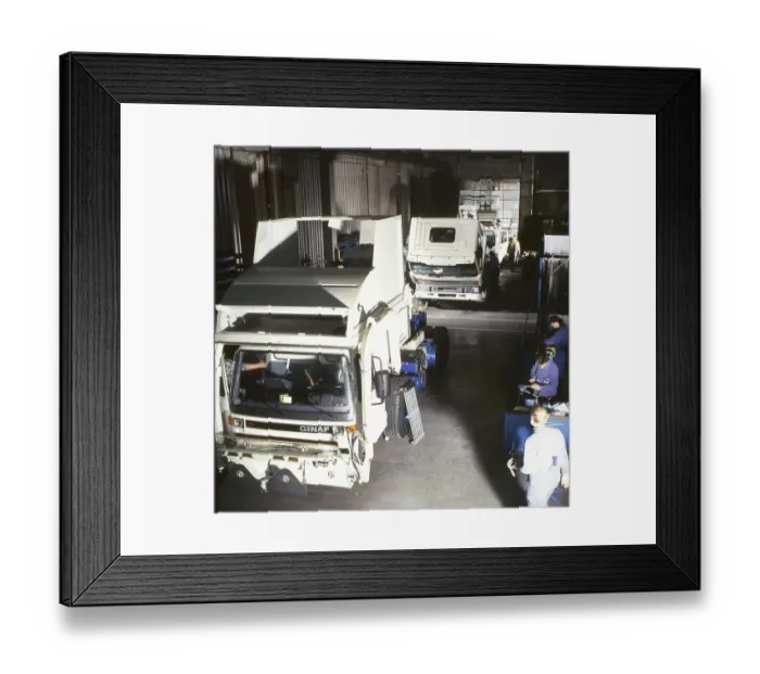 Framed Print : The refuse collection vehicles