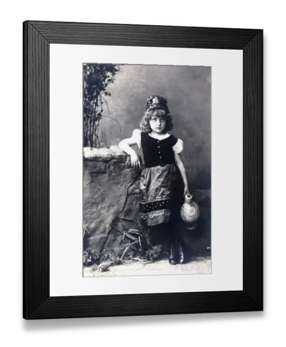 Framed Print : Girl in historic costume with a crock postcard about 1900 Framed Print : Girl in historic costume with a crock postcard about 1900