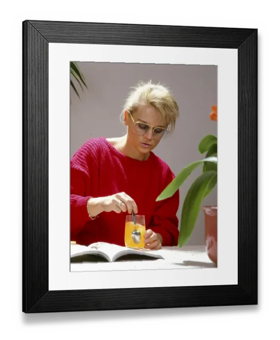 Framed Print : Young woman stirred effervescent tablet in Gals Vitamins Framed Print : Young woman stirred effervescent tablet in Gals Vitamins