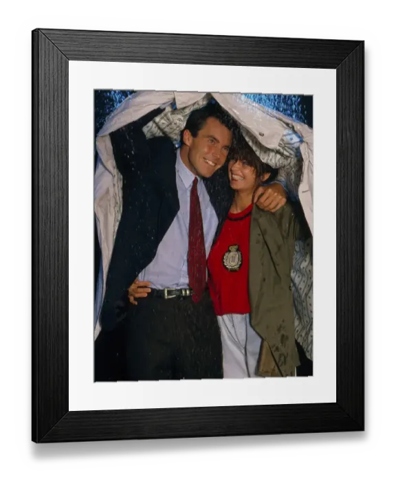 Framed Print : Couple in the rain
