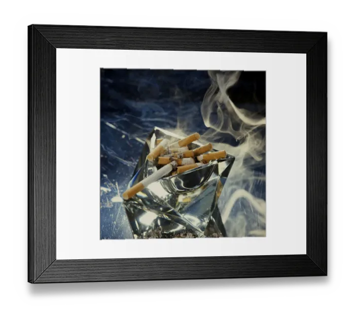 Framed Print : Ashtray with smoking cigarette butts