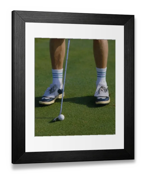 Framed Print : Putter and golf ball on the green