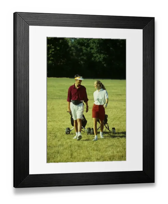 Framed Print : Women golfers on the golf course