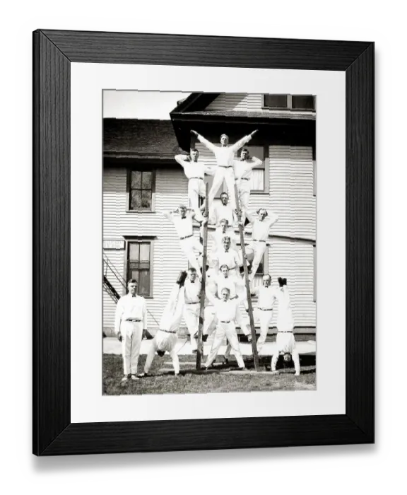 Framed Print : Acrobats with two ladders, ca. 1920