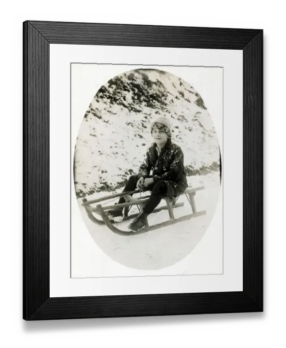 Framed Print : Winter sports, boy sledding, 1920s Framed Print : Winter sports, boy sledding, 1920s