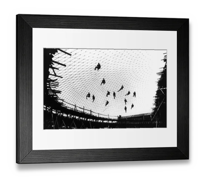 Framed Print : Workers build a net of steel, 1930s Framed Print : Workers build a net of steel, 1930s