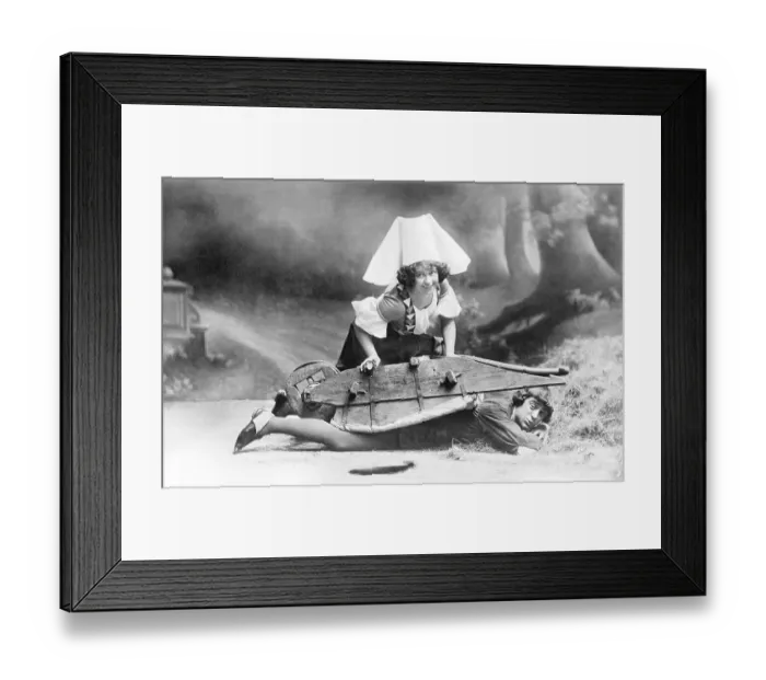 Framed Print : Couple, theater, overturned wheelbarrow