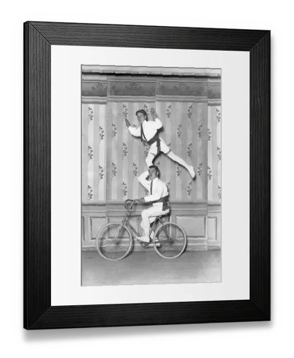 Framed Print : Two acrobats on a bicycle, 1930s, Germany, Europe Framed Print : Two acrobats on a bicycle, 1930s, Germany, Europe